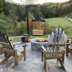 Tavern230 - Outdoor patio Adirondack chairs fire pit mountain side view
