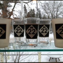 Pint glasses on the shelves