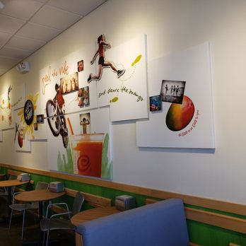 Jamba - a dining area with tables and chairs - Juice Bars & Smoothies Near Me - Surprise, Arizona
