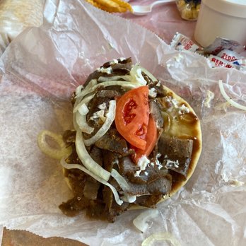 Munchie P's - a hamburger with onions and tomatoes - Burgers Near Me - Geneva, Illinois