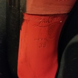 The rubber is not flush with the sole, there is black paint and adhesive all over the shoe. Designer's name partially covered The rubber is not flush with the sole, there is black paint and adhesive all over the shoe. Designer's name partially covered