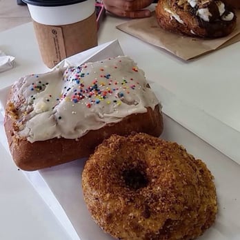Sweet Dozen - crumb and s'mores doissant, and the poptart donut with a real strawberry poptart baked inside. delicious! - Donuts Near Me - Sacramento, California Sweet Dozen - crumb and s'mores doissant, and the poptart donut with a real strawberry poptart baked inside. delicious! - Donuts Near Me - Sacramento, California
