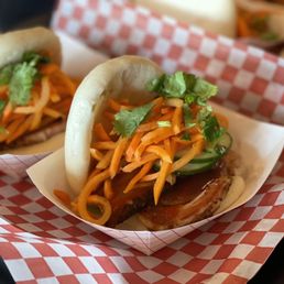 two buns with meat and vegetables two buns with meat and vegetables