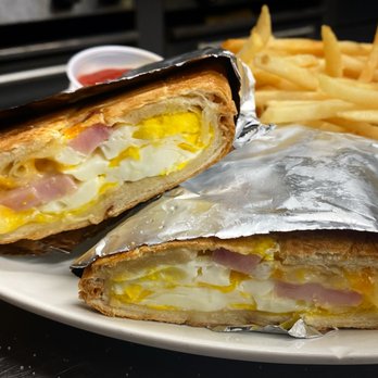 Rincon Tropical - a sandwich and french fries - Puerto Rican Near Me - Detroit, Michigan
