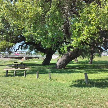 Beason's Crossing Park - Picnic tables under shaded trees - Parks Near Me - Columbus, Texas