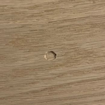 Careful Movers - Damaged floor after bed leg was dropped on the floor the screw side down. - Movers Near Me - Menlo Park, California
