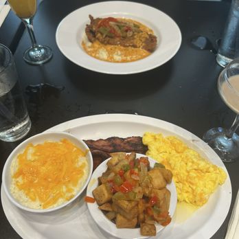 Grits and Eggs Breakfast Kitchen - Traditional breakfast with turkey bacon, cheese grits, home fries and cheesy scrambed eggs as well as fried fish and grits. - Breakfast & Brunch Near Me - Atlanta, Georgia Grits and Eggs Breakfast Kitchen - Traditional breakfast with turkey bacon, cheese grits, home fries and cheesy scrambed eggs as well as fried fish and grits. - Breakfast & Brunch Near Me - Atlanta, Georgia