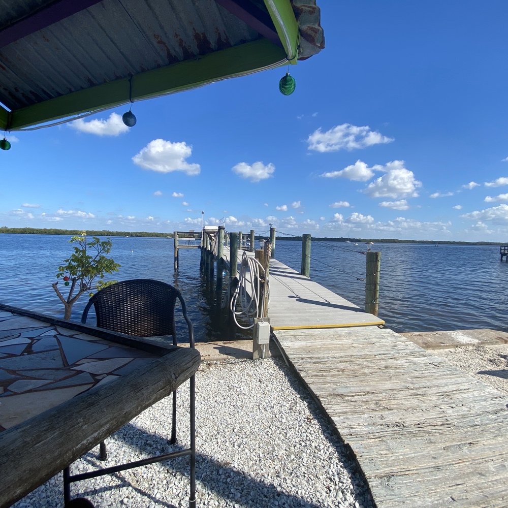 Sugar Sand Beach RV Resort - Fishing dock and tiki bar - RV Parks Near Me - Matlacha, Florida Sugar Sand Beach RV Resort - Fishing dock and tiki bar - RV Parks Near Me - Matlacha, Florida