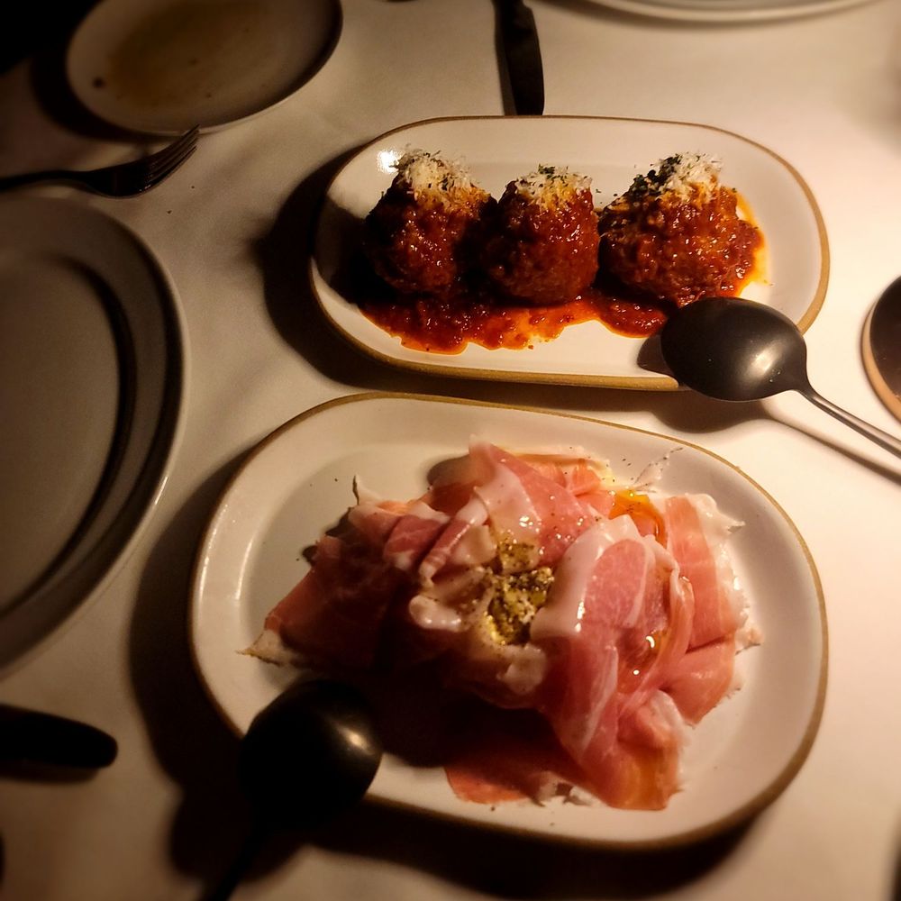 Tucci - Burrata with prosciutto. Prosciutto must have been at least a 12yo. It paired perfectly with the burrata. Meatballs almost stole the show. - Cocktail Bars Near Me - New York, New York Tucci - Burrata with prosciutto. Prosciutto must have been at least a 12yo. It paired perfectly with the burrata. Meatballs almost stole the show. - Cocktail Bars Near Me - New York, New York
