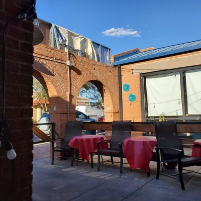 Photo of La Perla Sports Cantina - Glendale, AZ, US. tables and chairs outside
