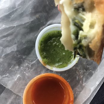 Cesar's Empanadas - Last couple bites of my spinach & cheese empanada - Food Trucks Near Me - Brooklyn, New York