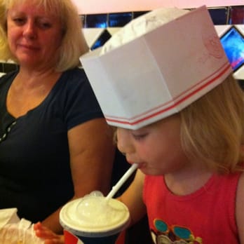 Little Anthony's Diner - Blowing milk bubbles and wearing a little Anthony's hat! - American Near Me - Tucson, Arizona