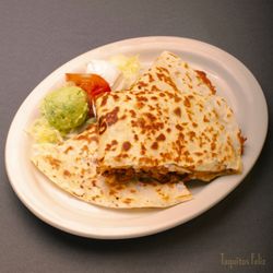 Taquitos Feliz - Quesadilla with your choice of meat, a scoop of sour cream and guacamole.