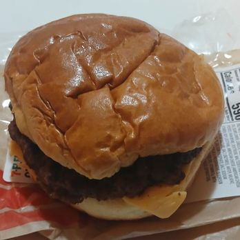 7-Eleven - 7-Eleven Cheeseburger: ¼-pound flame-broiled 100% beef patty, topped with a slice of American cheese, in a brioche bun - Convenience Stores Near Me - West New York, New Jersey 7-Eleven - 7-Eleven Cheeseburger: ¼-pound flame-broiled 100% beef patty, topped with a slice of American cheese, in a brioche bun - Convenience Stores Near Me - West New York, New Jersey