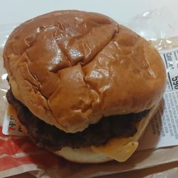 7-Eleven - 7-Eleven Cheeseburger: ¼-pound flame-broiled 100% beef patty, topped with a slice of American cheese, in a brioche bun