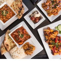 Masala Square Indian Kitchen - Featuring:
Chicken Tikka Masala
Channa Masala
Supreme Samosa
Garlic Naan
Vegetable Pakora
Gulab Jamun Sundae