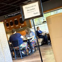 Spiro's Pizza and Pasta - Partial pic of dining area while waiting for to go order.