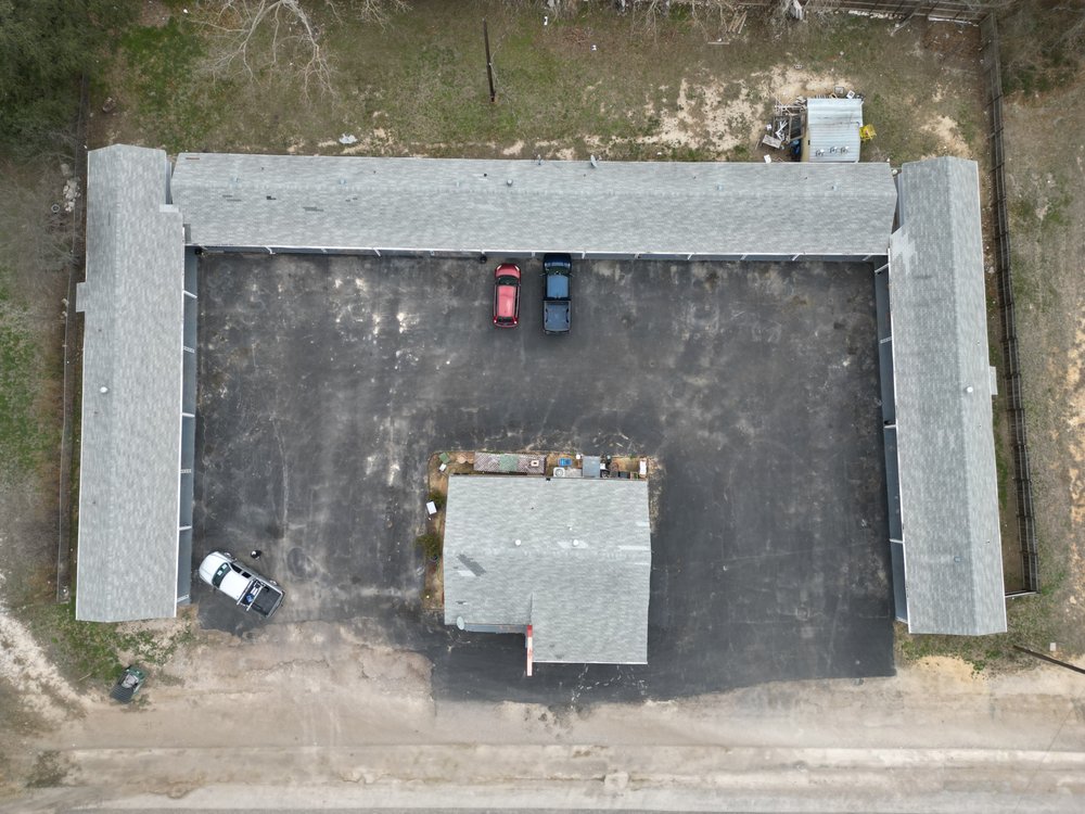 Slide of Sagan Commercial Roofing