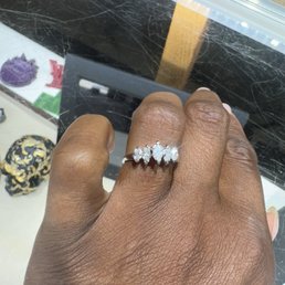 New engagement and band from old set (30 years) made into one piece. Not soldered together but one ring. From yellow to white gold rodium.