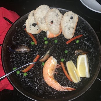 Toro Kitchen + Bar - Paella en tinta de calamar - Tapas Bars Near Me - San Antonio, Texas Toro Kitchen + Bar - Paella en tinta de calamar - Tapas Bars Near Me - San Antonio, Texas