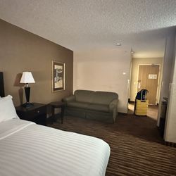 First Choice Inn - The layout of this room is a little strange, especially considering you can't really see the TV from the sofa thing