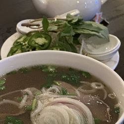 Pho Viet Hoa - Pho with steak and brisket and a pot of jasmine tea in the background