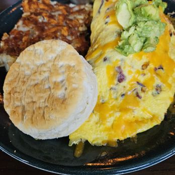 Reunion Kitchen + Drink - Avocado, bacon, and cheese omelet with hashbrowns and a biscuit. - New American Near Me - Brea, California