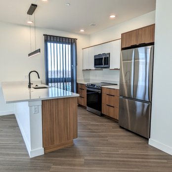 Sens Flooring - a kitchen with stainless steel appliances - Flooring Near Me - Billerica, Massachusetts