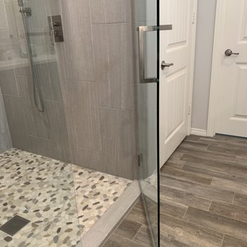 Pasco Tile Marble & Granite - Flipper shower door opens outward and inward - General Contractors Near Me Pasco Tile Marble & Granite - Flipper shower door opens outward and inward - General Contractors Near Me