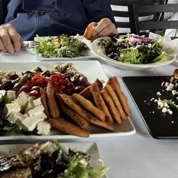 A wonderful lunch with Mediterranean special appetizer and spinach pies. A wonderful lunch with Mediterranean special appetizer and spinach pies.