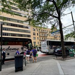 Academy Bus - Three buses meet here Upper East Side Fridays to take kids on a day trip. 07/11/25