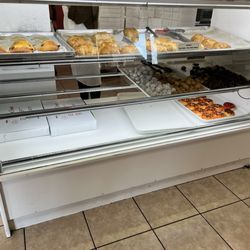 Sunrise Donuts - Display case of croissants