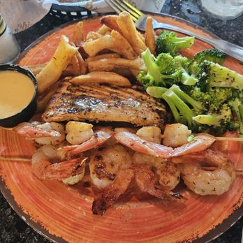 Crabby's On The Pass - Seafood combo with Mahi and shrimp, and conch fritters - Seafood Near Me - Treasure Island, Florida