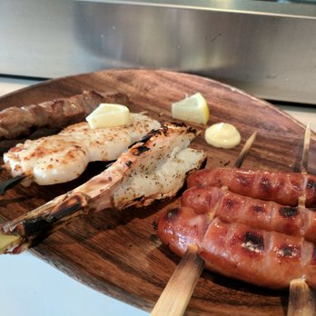 Oak & Coal - Left to right: grassfed prime ribeye, scallops, jumbo white shrimp, and kurobuta sausages - Japanese Near Me - Costa Mesa, California Oak & Coal - Left to right: grassfed prime ribeye, scallops, jumbo white shrimp, and kurobuta sausages - Japanese Near Me - Costa Mesa, California