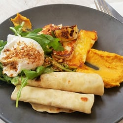 Putia Pure Food - Grilled halloumi, Moroccan spiced carrot hummus, poached egg, wholemeal house made flatbread, rocket and grilled lime for that dash of juice