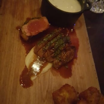 Geraldine's - Steak with mushroom fondue and cheesey tater tots. - New American Near Me - Austin, Texas