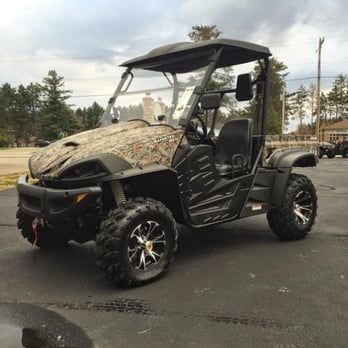 Central Wisconsin Powersports - a utility vehicle in a parking lot - Snow Removal Near Me - Schofield, Wisconsin Central Wisconsin Powersports - a utility vehicle in a parking lot - Snow Removal Near Me - Schofield, Wisconsin