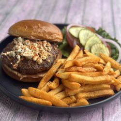 Elmhurst Grille - Cajun Black & Bleu - 6 oz burger patty dusted with our homemade Cajun seasoning, topped with Blue cheese crumbles.