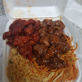 Panda Bowl - Fried Rice/Chow Mein, Orange Chicken and Sesame Chicken. Look at how much food they packed into that box! - Chinese Near Me - Fountain Valley, California Panda Bowl - Fried Rice/Chow Mein, Orange Chicken and Sesame Chicken. Look at how much food they packed into that box! - Chinese Near Me - Fountain Valley, California