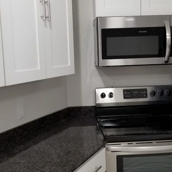 J & M Remodeling Family Owned - a kitchen with stainless steel appliances - General Contractors Near Me J & M Remodeling Family Owned - a kitchen with stainless steel appliances - General Contractors Near Me