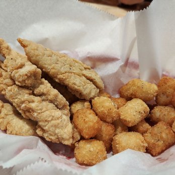 Wings Etc - a basket of fried chicken nuggies - Chicken Wings Near Me - Topeka, Kansas