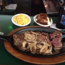 Johanns Lounge And Bar - Perfectly done rare steak with 2 sides for only $14.99.