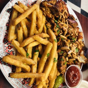 Jerusalem Market & Restaurant - a plate of french fries and pickles - Middle Eastern Near Me - Memphis, Tennessee