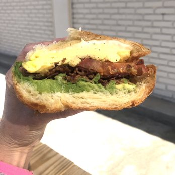 BJ Cinnamon - Bacon, egg, cheese, avocado, and tomato on a croissant - Bakeries Near Me - Folsom, California