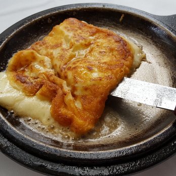 Santorini Estiatorio - 2017-06-26. Santorini. Thornhill, ON. Cheese (Kefalotyri) Saganaki. 5 stars. - Greek Near Me - Thornhill, Ontario