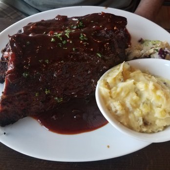 Campbell’s Pub & Veranda - Bbq ribs with potato salad. The potato salad was ok, but the ribs weren't fall-off-the-bone. Still flavorful. - New American Near Me - Chelan, Washington Campbell’s Pub & Veranda - Bbq ribs with potato salad. The potato salad was ok, but the ribs weren't fall-off-the-bone. Still flavorful. - New American Near Me - Chelan, Washington