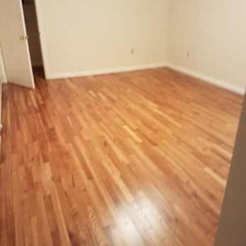 Sousa's Fine Floors - an empty room with hard wood floors - Flooring Near Me - Sturbridge, Massachusetts