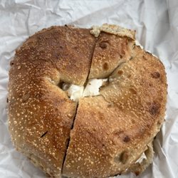 The Bagel Club - Sunflower bagel toasted with garlic & herb spread