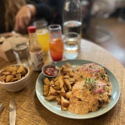 Tartine Brunch Club - Huevos Benitos w a spicy strawberry mimosa