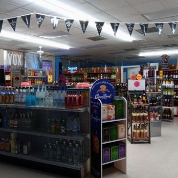 SWINGING BRIDGE LIQUOR &WINE - a display of liquor - Beer, Wine & Spirits Near Me - Byram, Mississippi SWINGING BRIDGE LIQUOR &WINE - a display of liquor - Beer, Wine & Spirits Near Me - Byram, Mississippi